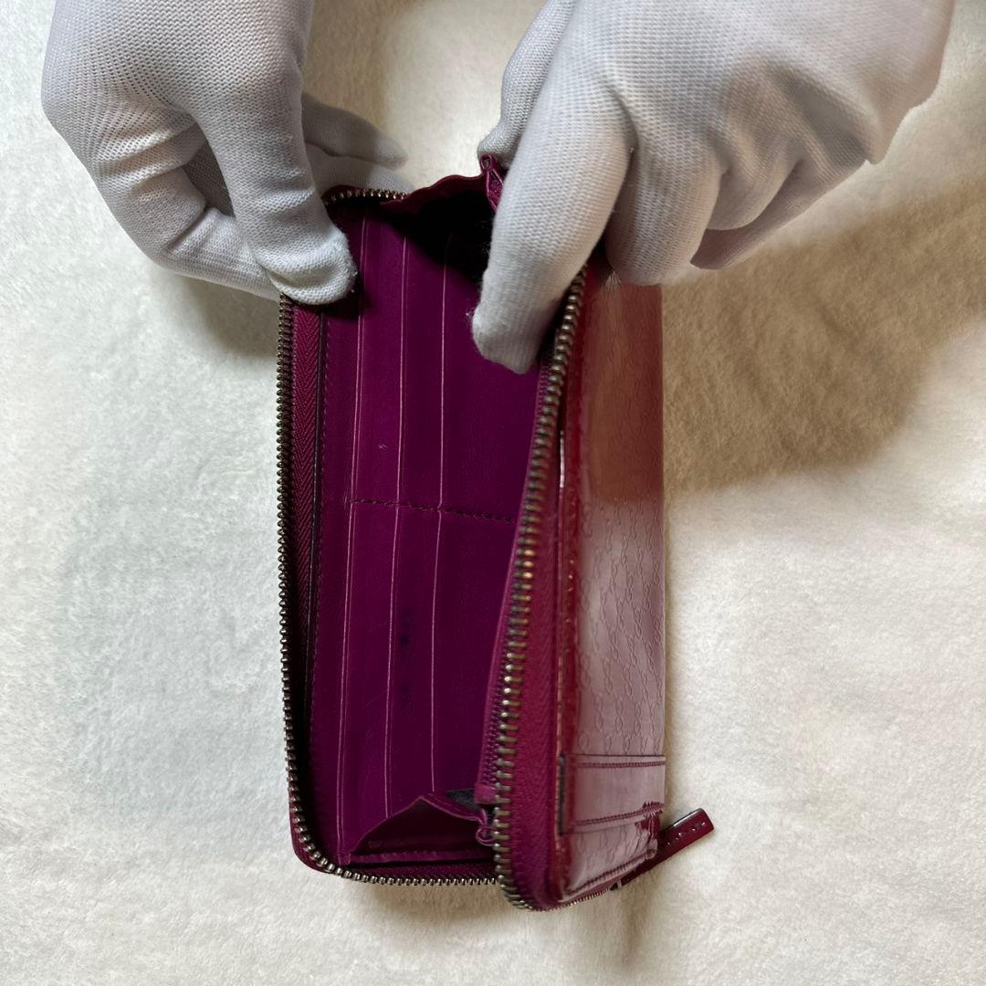 GUCCI（グッチ）マイクログッチシマ エナメルラウンドファスナー長財布